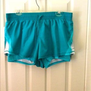 Champion sport shorts in XXL in Aqua blue.
